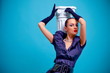 Beautiful fashion girl on the blue background Beautiful fashion girl on the blue background