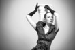 Beautiful fashion girl on the grey background Beautiful fashion girl on the grey background