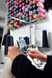 Tailor using industrial sewing machine