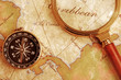 compass on a Treasure map background ,with Magnifier compass on a Treasure map background ,with Magnifier
