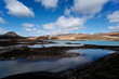 Blue lagoon in front of a geothermal powerplant Blue lagoon in front of a geothermal powerplant