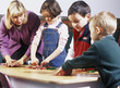 Children doing a craft With Teacher
