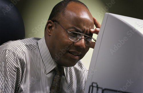 Photo: Businessman In Front Of Computer Businessman In Front Of Computer
