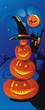 Amusing composition from pumpkins in a hat. Halloween