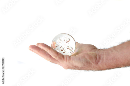 Photo: Hand holding crystal ball Hand holding crystal ball