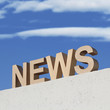 NEWS Schriftzug vor blauem Himmel mit Wolken