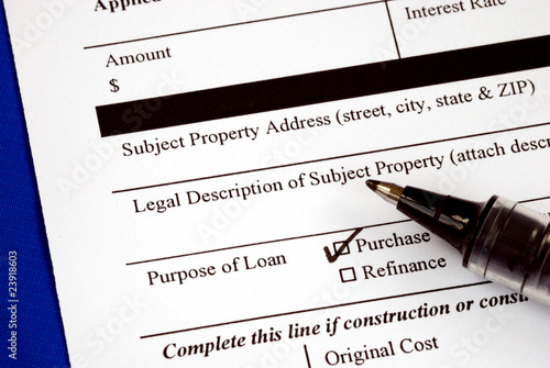 Photo: Fill out the home mortgage application form Fill out the home mortgage application form