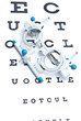 optometry concept - sight measuring spectacles & eye chart