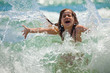 Little girl at sea in sunny day