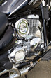 Motorbike's chromed engine. Bikes in a street Motorbike's chromed engine. Bikes in a street