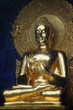 Buddha behind glass with water droplets Buddha behind glass with water droplets