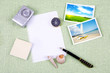 A pile of clutter items on green background A pile of clutter items on green background