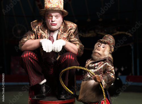 Photo: Circus clown with a monkey. Circus clown with a monkey.