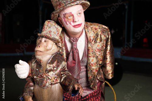 Photo: Circus clown with a monkey. Circus clown with a monkey.