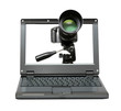 Foto: laptop with camera on tripod laptop with camera on tripod