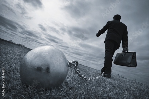 Photo: Businessman With Ball And Chain Businessman With Ball And Chain