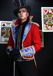 Man in expensive suit of illusionist-conjurer.