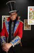 Man in expensive suit of illusionist-conjurer.