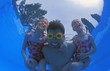 Photo: Family Group In Swimming Pool Family Group In Swimming Pool