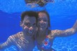 Photo: Young Couple In Swimming Pool Young Couple In Swimming Pool