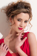 Close-up of beautiful girl with red vogue maekeup