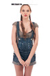 Young playful woman holding hand saw