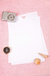Clutter of objects stacked on pink background Clutter of objects stacked on pink background