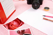Clutter of objects stacked on pink background Clutter of objects stacked on pink background