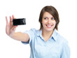 Self photography - Happy young lady taking picture