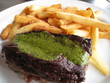 Steak and fries with green garlic sauce