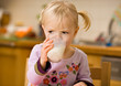 little girl drinking milk