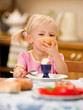 girl eating breakfast