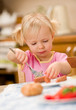 girl eating breakfast