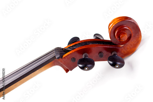 Photo: Close-up of a classic cello scroll isolated on white background Close-up of a classic cello scroll isolated on white background