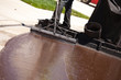Road Worker Resurfacing Street