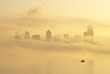"Silhouette of Seattle highrises through fog, Washington"