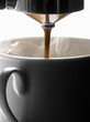 cup of expresso coffee under the percolator