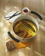macerating the spices in the syrup