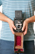man with retro camera man with retro camera