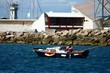 pêcheur en barque pêcheur en barque