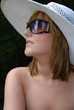 Young beautiful woman in white hat Young beautiful woman in white hat