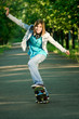 Foto: Teenage girl with skateboard Teenage girl with skateboard