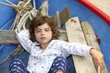 little girl having rest on traditional balearic boat little girl having rest on traditional balearic boat