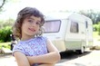 little children girl posing caravan camping vacation