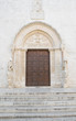 Wooden Portal of Bitetto Cathedral. Apulia.