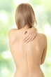 Pain in her back