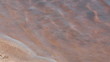 Sandy river bank closeup.