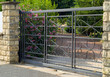 Beautiful black  gate, entrance to a front yard