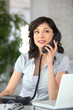 Photo : Portrait d\'une femme au bureau