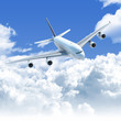 Photo: airplane flying over the clouds front top view airplane flying over the clouds front top view
